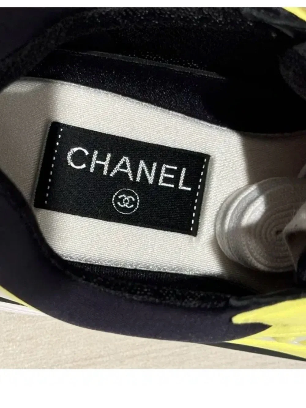 CHANEL Women’s Neon Yellow and White Logo Sneakers